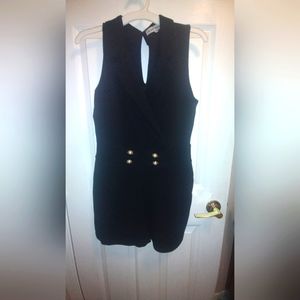 Black crepe romper. Size L